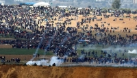 غزة : 13 شهيداً فلسطنياً ومئات الجرحى بمواجهات "مسيرة العودة الكبرى"